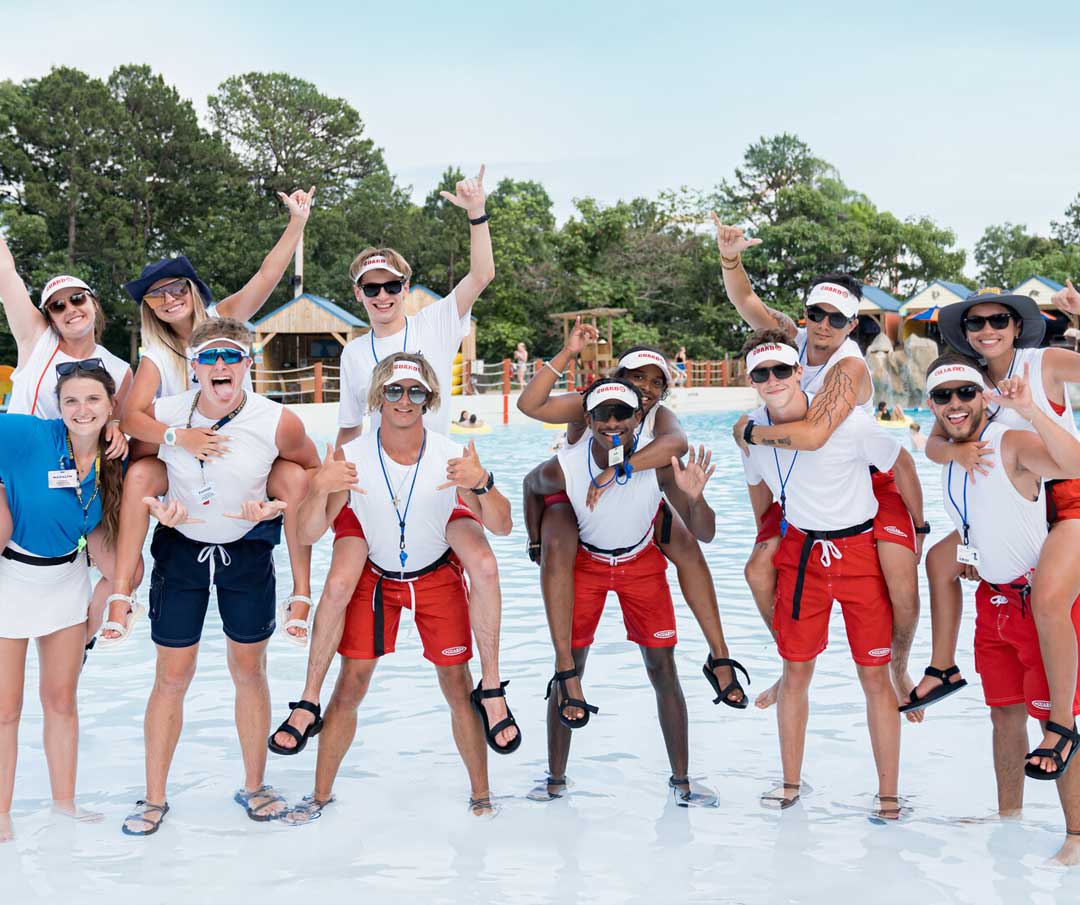 Group of lifeguards at wave pool
